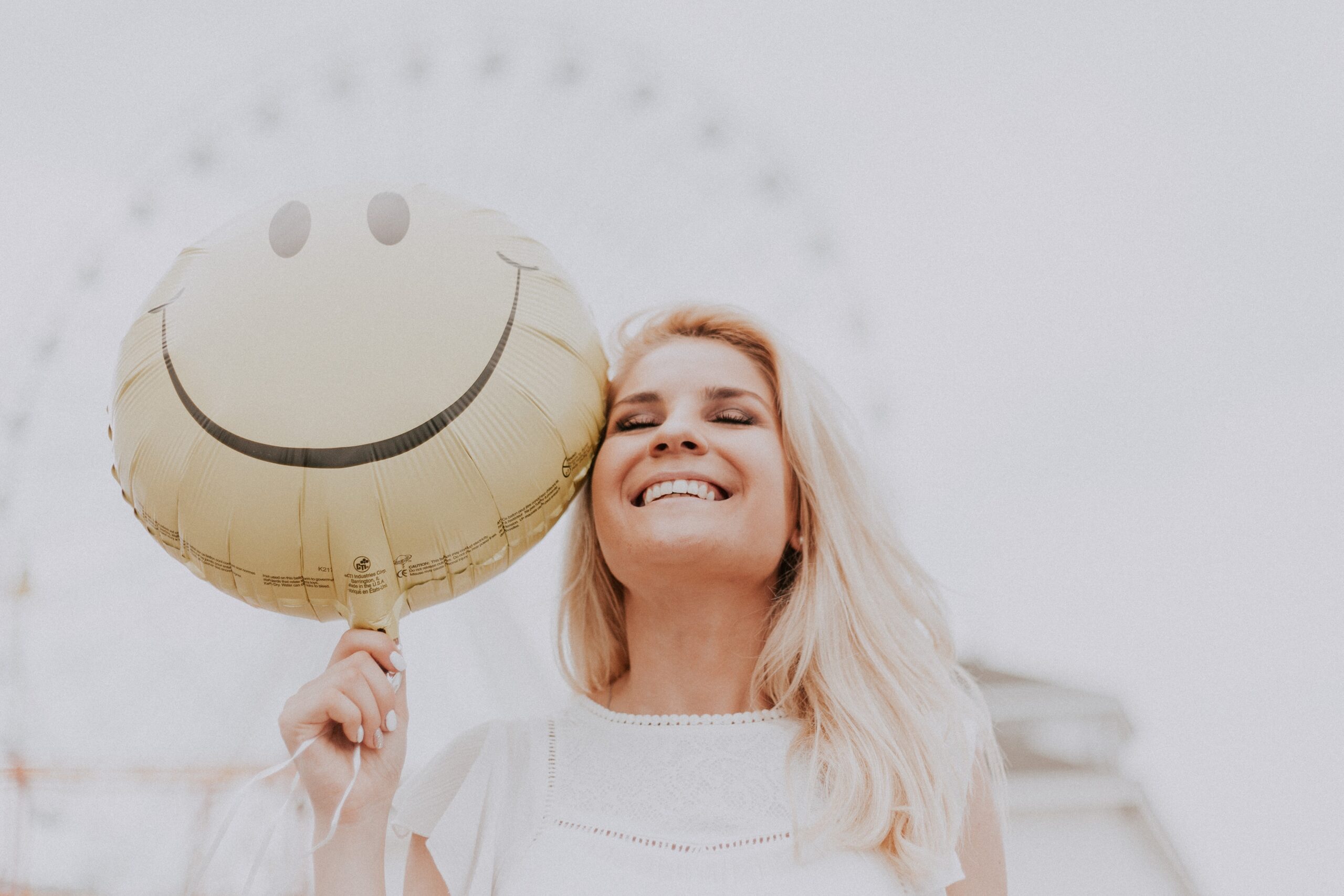 Positive thinking - woman with balloon